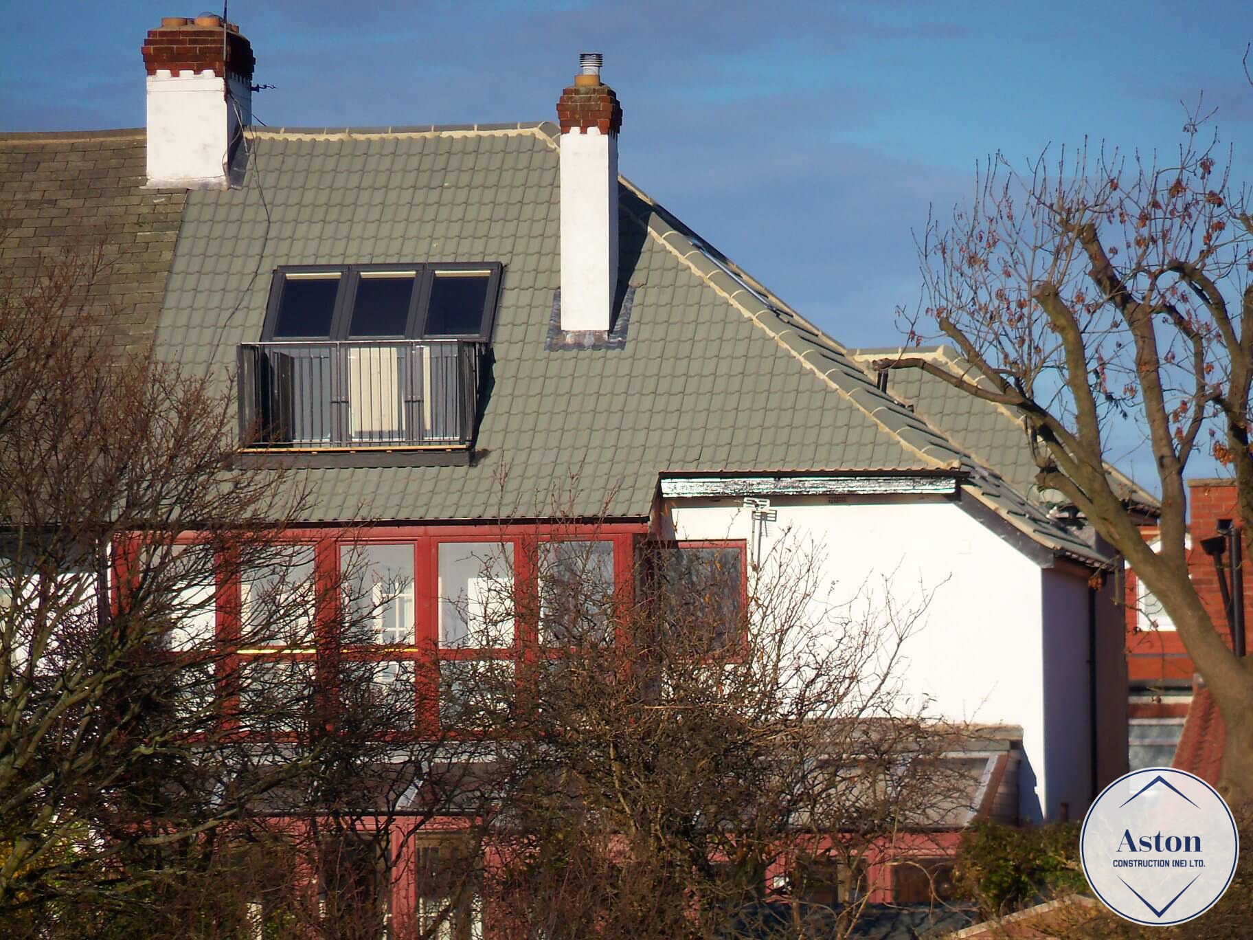 Loft Conversion with Velux Balcony Aston Construction (NE) Ltd.